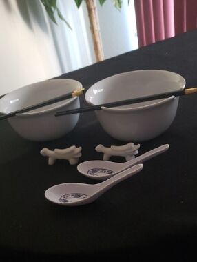Cost Plus World Market White Ceramic Bowls with Spoons, Chopsticks and holders.